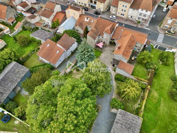 Demeure avec cachet, garage double, annexes, jardin paysager de 1459 m².