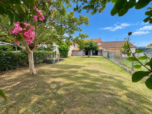 Maison de ville avec jardin – 105 m² – Beau potentiel