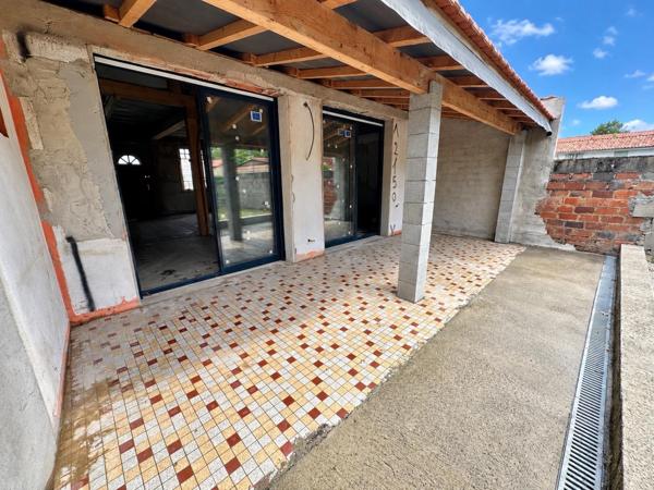 Maison de ville avec jardin – 105 m² – Beau potentiel