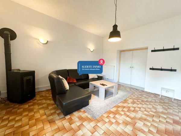 Maison semi-individuelle de type semi plain pied de 113,94 m2, 2 ch + 2 coins nuits, cour intérieur, jardin et 2 places de stationnements intérieur