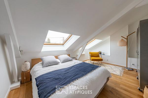 Maison d’architecte rénovée avec piscine et jardin.