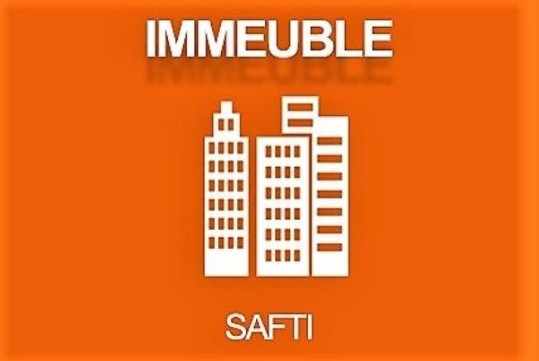 Immeuble de rapport 7 logements + garage et ses annexes