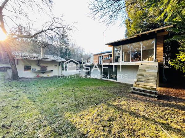 Maison avec grand terrain et rivière