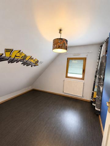 Maison familiale à Questembert – 4 chambres, jardin clos de 1 075 m²