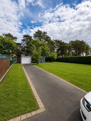 Maison familiale à Questembert – 4 chambres, jardin clos de 1 075 m²