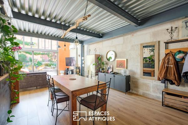Esprit loft en coeur de ville : lieu de vie climatisé avec terrasse et garage