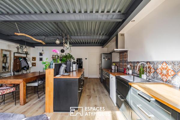 Esprit loft en coeur de ville : lieu de vie climatisé avec terrasse et garage