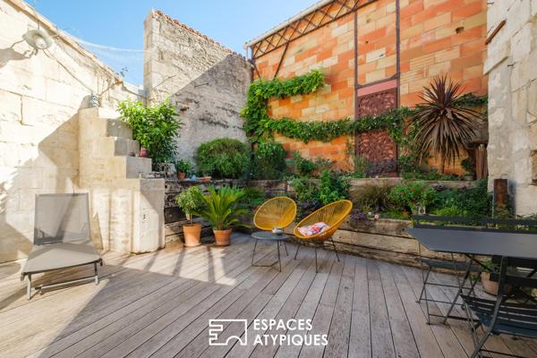 Esprit loft en coeur de ville : lieu de vie climatisé avec terrasse et garage
