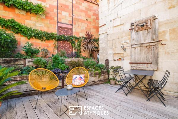 Esprit loft en coeur de ville : lieu de vie climatisé avec terrasse et garage