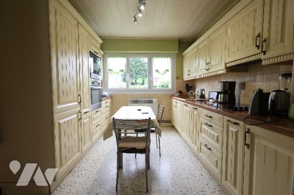Charmante maison individuelle - 3 chambres - garage - terrain de 887m²