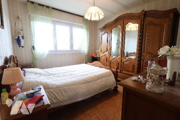 Charmante maison individuelle - 3 chambres - garage - terrain de 887m²