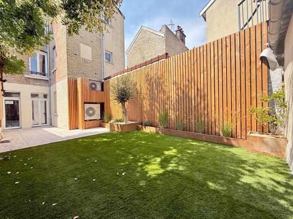 Maison avec extérieur et garage proche centre ville