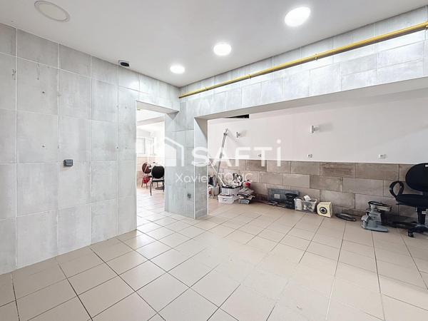 MAISON A USAGE MIXTE