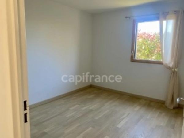 TASSIN-la-DEMI-LUNE, appartement Pitance de 71m2, en rez-de-jardin, 2 chambres.