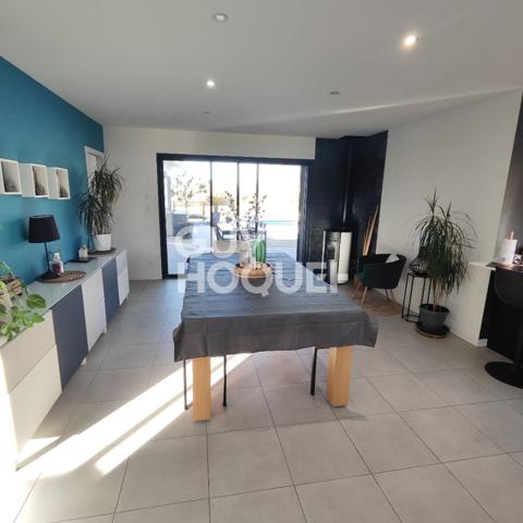 Contemporaine de 116m2, 3 chambres, piscine et garage