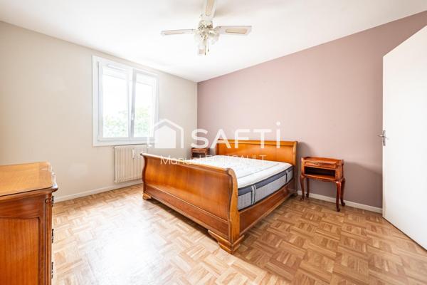 Chevigny-saint-Sauveur, appartement traversant T4 de 85 m2 - 2 chambres -double séjour-parc et stationnement