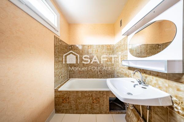 Chevigny-saint-Sauveur, appartement traversant T4 de 85 m2 - 2 chambres -double séjour-parc et stationnement