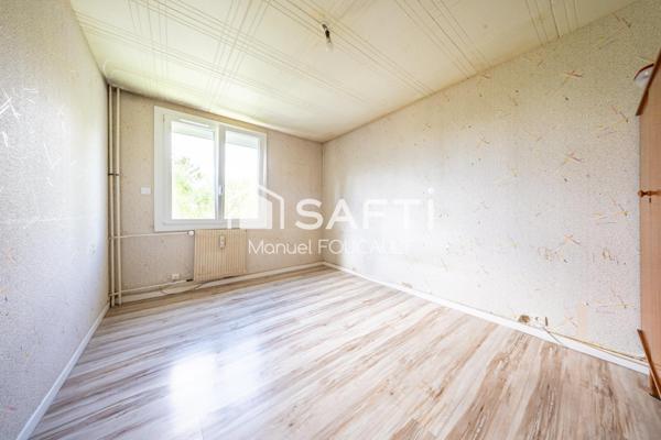 Chevigny-saint-Sauveur, appartement traversant T4 de 85 m2 - 2 chambres -double séjour-parc et stationnement