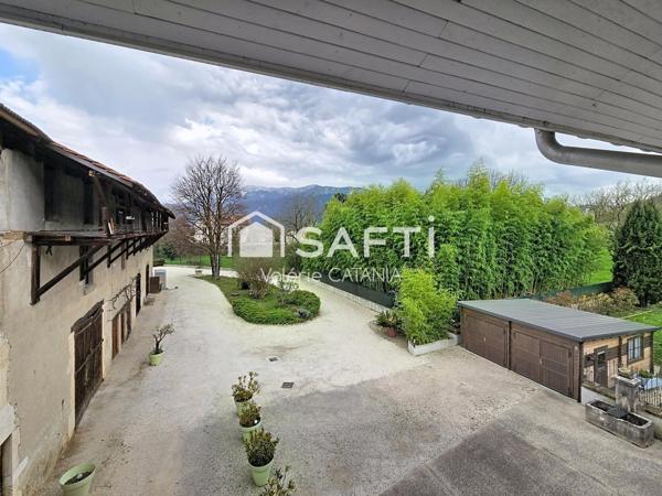 Tullins - Maison mitoyenne de 120m² habitables avec grand garage, cour.