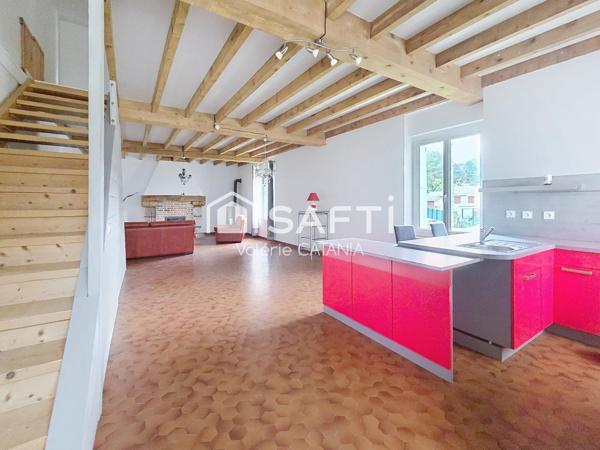 Tullins - Maison mitoyenne de 120m² habitables avec grand garage, cour.