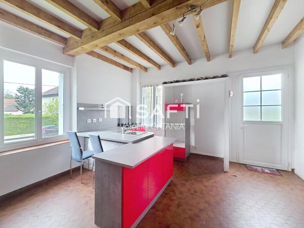 Tullins - Maison mitoyenne de 120m² habitables avec grand garage, cour.