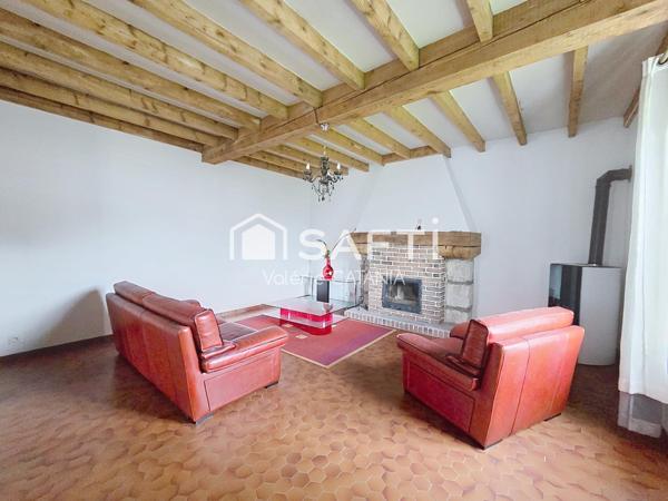 Tullins - Maison mitoyenne de 120m² habitables avec grand garage, cour.