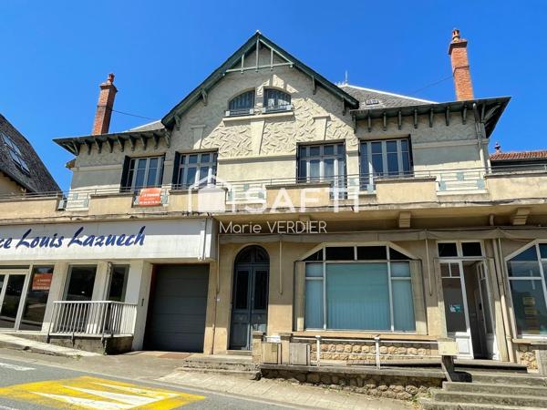 Immeuble avec 2 locaux commerciaux, un T5-T6 et un studio