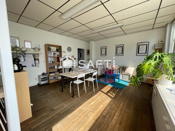 Immeuble avec 2 locaux commerciaux, un T5-T6 et un studio