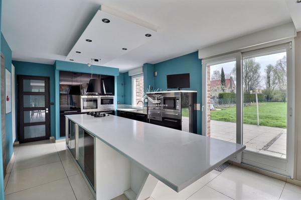 Maison individuelle 177 m² – 5 pièces – Jardin 1800 m² – Garages & stationnements privatifs – Wasquehal Boers