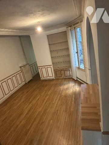 Un appartement au RDC + une cave situés à BOULOGNE-BILLANCOURT.