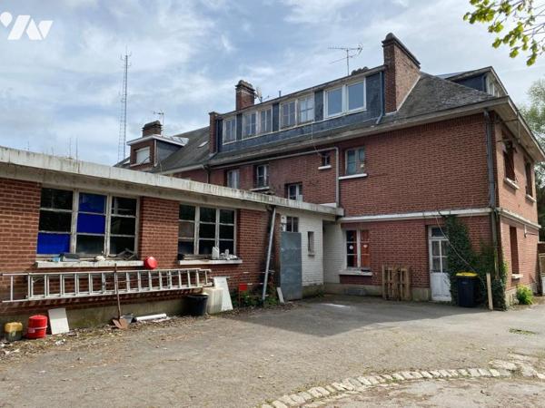 IMMEUBLE MIXTE à usage de commerce et d'habitation