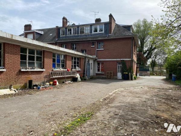 IMMEUBLE MIXTE à usage de commerce et d'habitation