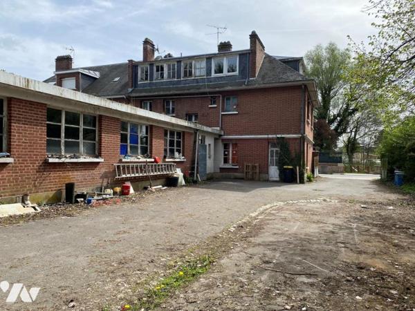 IMMEUBLE MIXTE à usage de commerce et d'habitation