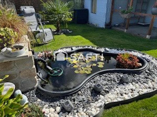 Maison rénovée , 3 chambres , garage , semi mitoyenne