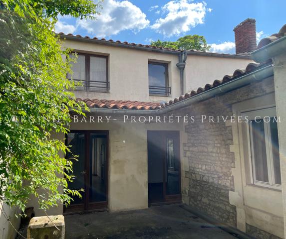 IMMEUBLE COMPOSE DE 4 APPARTEMENTS ET 1 MAISON AVEC JARDIN