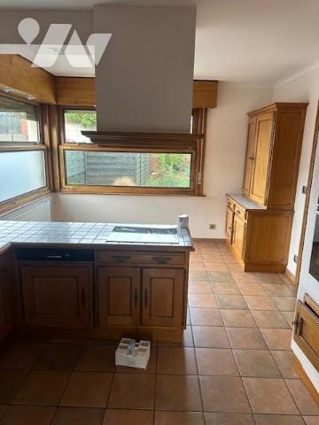 Ensemble immobilier comprenant une maison à usage d'habitation et un local professionnel