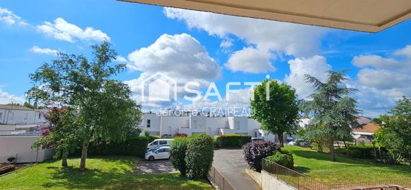 Secteur Gare : Appartement de 98m² avec 3 chambres, balcon, cave et garage.