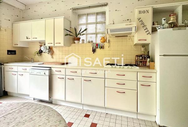 Maison familiale avec studio indépendant et bâtiment de 215 m²