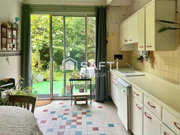 Maison familiale avec studio indépendant et bâtiment de 215 m²