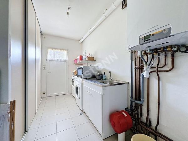 Maison à vendre à ANCENIS avec vie de plain-pied, 4 chambres, bureau, garage et jardin clos.