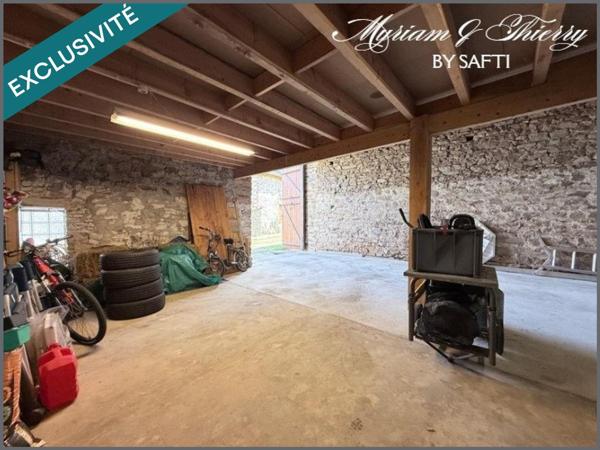 Maison rénovée avec grange jardin et puits