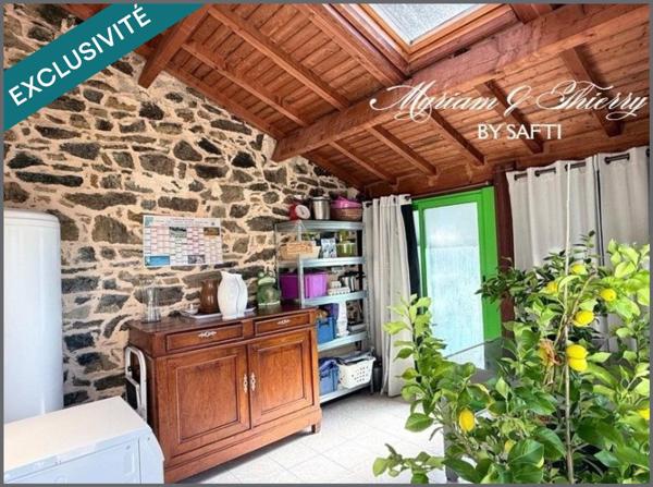 Maison rénovée avec grange jardin et puits