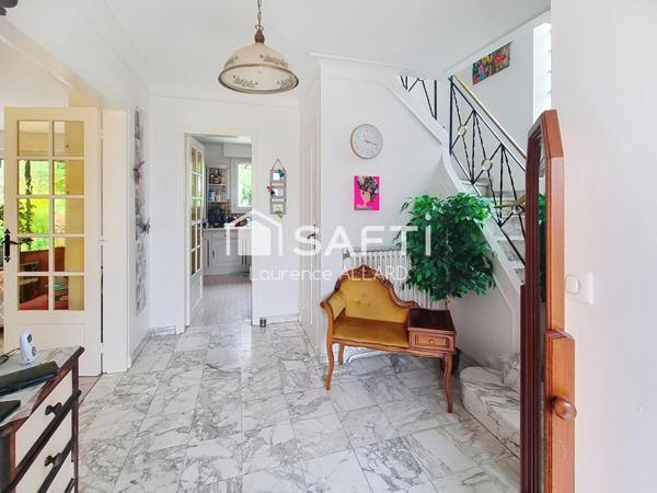 Maison coup de coeur dans quartier résidentiel