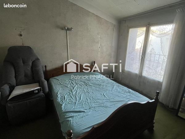 Maison d'habitation T3, sur 3 niveaux, 2 chambres, 2 WC, 1 salle d'eau, 1 garage