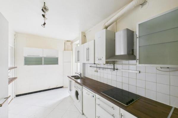 Vente - Appartement 4 pièces 99 m 2 Paris (75015)