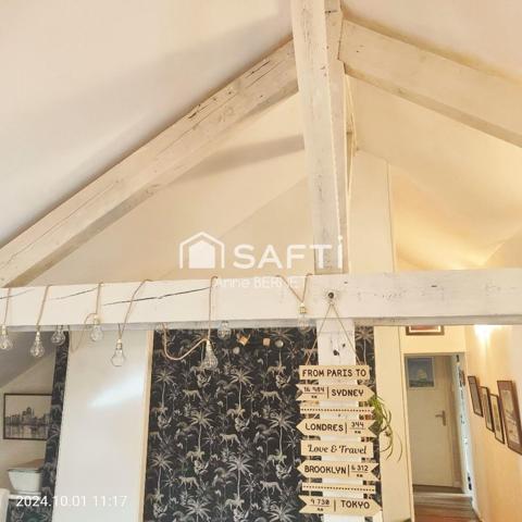 TRES BEL APPARTEMENT AVEC BEAUCOUP DE CACHET