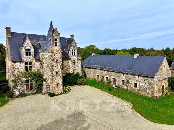 Manoir du XVe IMH, dépendances restaurées, étang 3.5ha avec île sur 18Ha