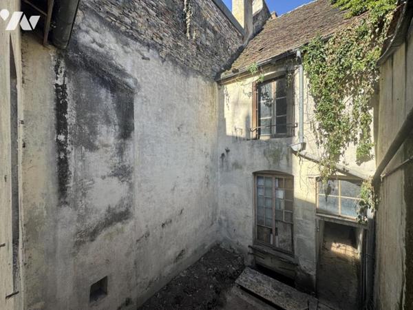 Immeuble complet avec deux locaux commerciaux 