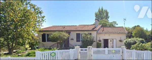 MIELAN (32) En quartier résidentiel, pavillon plain-pied actuellement loué (bail 3/6/9) sur 938m².