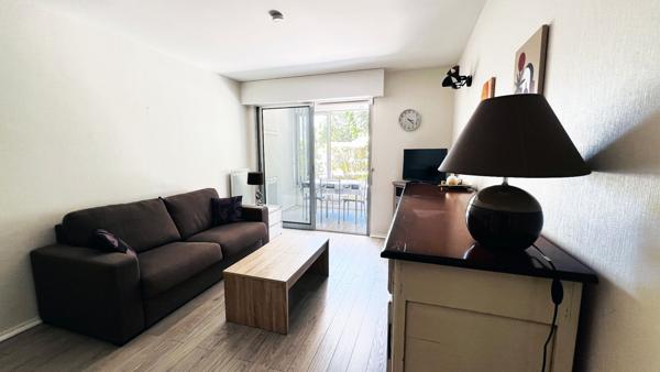 Appartement proche plage et commerces avec garage véranda et jardinet